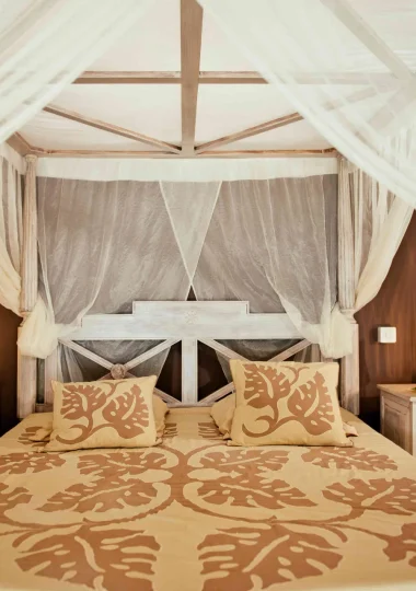 Bed in a Tahitian guesthouse© Hélène Havard