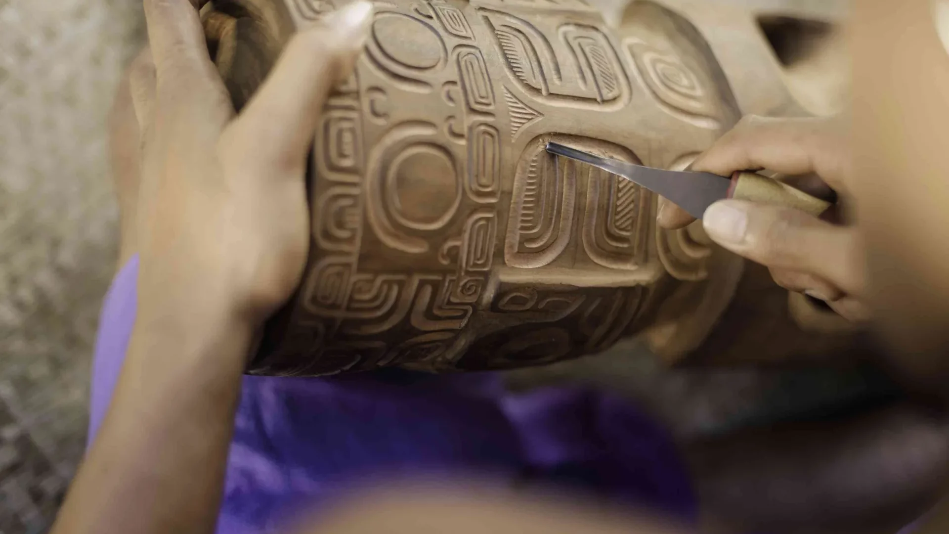 Wood carving of a tiki© Myles McGuinness